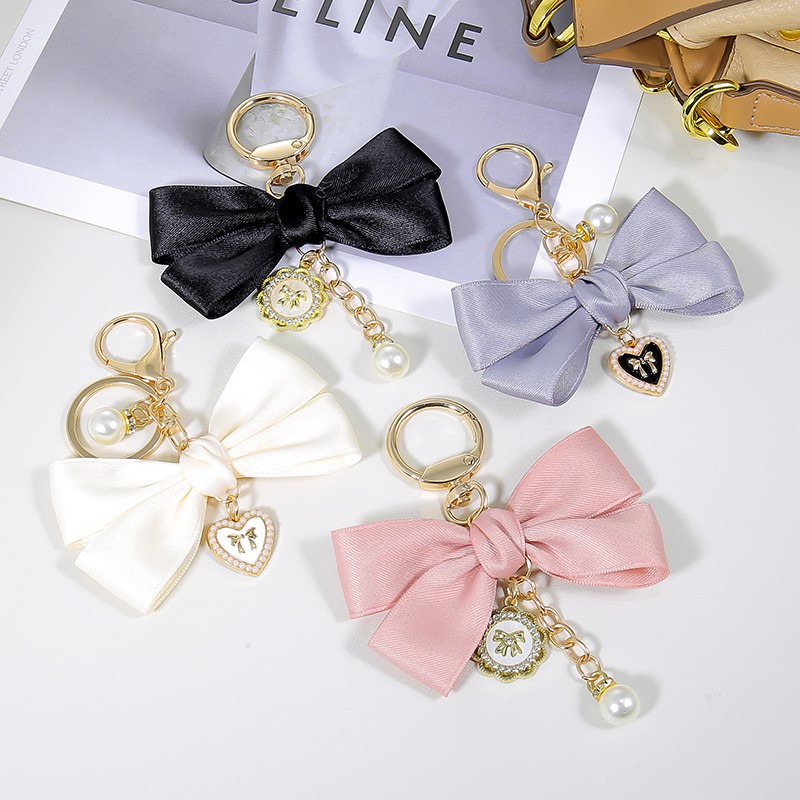 Dameshanger Modieuze strikknoo - Phone Accessories Wholesale In China recensie en prijs